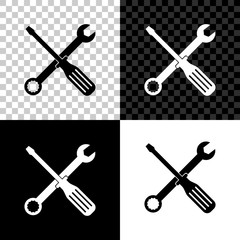 Spanner and screwdriver tools icon isolated on black, white and transparent background. Service tool symbol. Vector Illustration