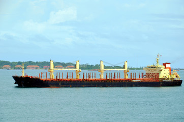 Cargo ship entering Panama Canal in the Cristobal, Panama. 