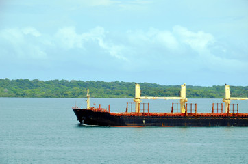 Cargo ship entering Panama Canal in the Cristobal, Panama. 