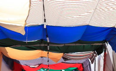 Colorful fabrics cover in an arab market