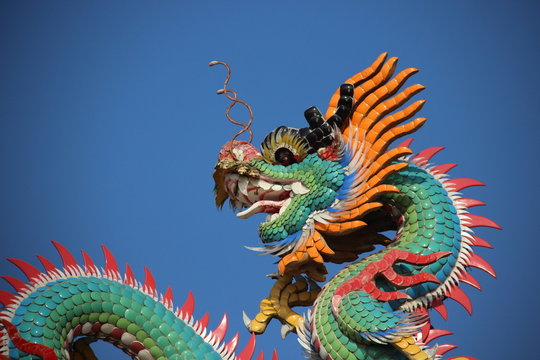 fantasy Animals. Colorful Ceramic Dragon Decoration On Shrine Roof