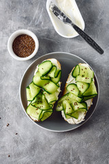 Sandwiches with cream cheese and cucumber.