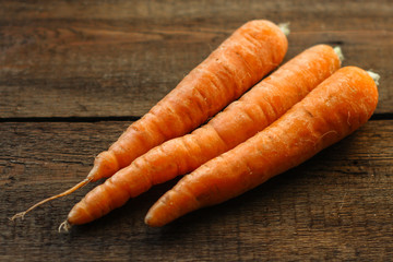 carrots (harvest, fresh and juicy vegetables). food background. top view. copy space