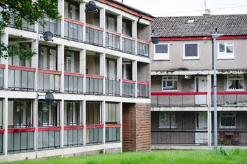 Fototapeta na wymiar Poor council house flats abandoned in village with bad poverty