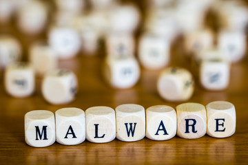 Maleware written with wooden cubes