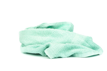 Light green terry towel isolated on white background.