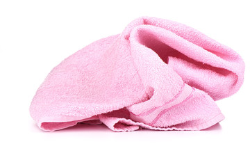 Pink terry towel isolated on white background.