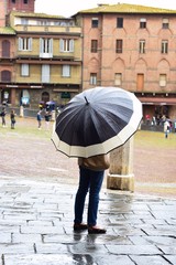 woman with umbrella in the rain