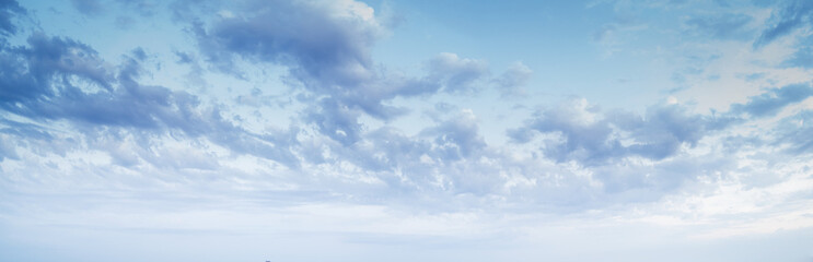 Panorama of blue sky with light clouds