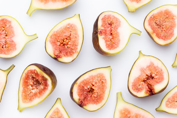 Fig fruits isolated on white background. Top view. Flat lay pattern