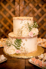 Delicious decorated cake at festive dessert party table