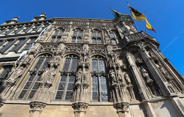 Fototapeta na wymiar Amazing medieval building of City Hall in Ghent, Belgium. It is one of the most popular spot in the city.