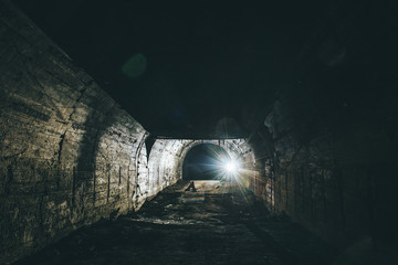 Underground concrete tunnel or corridor of abandoned nuclear bunker or shelter or basement