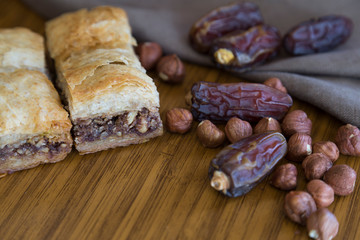 Turkish style vegan baklava or Antep baklava with nut,date fruit, pistachio for presentation and service and food photography. 