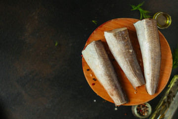 fish raw hake (set of ingredients for cooking). food background. top view. copy space