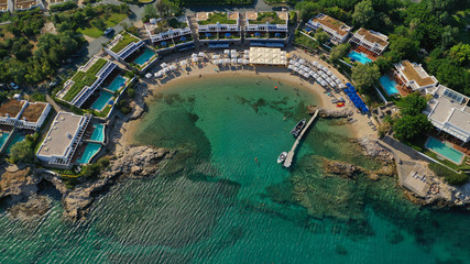 Fototapeta na wymiar Aerial top view photo of tropical sandy paradise beach with pool facilities in exotic island