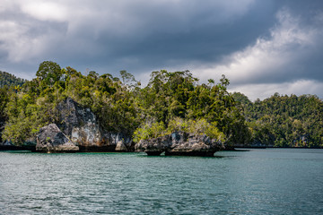 Waigeo, Kri, Mushroom Island, group of small islands in shallow blue lagoon water, Raja Ampat, West Papua, Indonesia