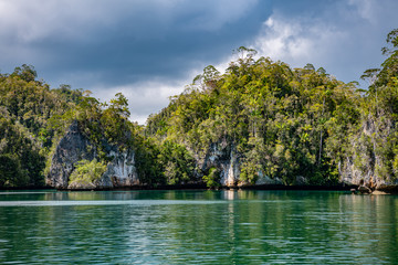 Waigeo, Kri, Mushroom Island, group of small islands in shallow blue lagoon water, Raja Ampat, West Papua, Indonesia