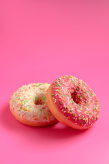 donuts on pink background
