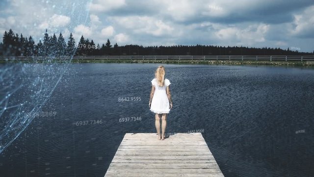 Computer cyberspace network and a woman standing on wooden pier at lake.