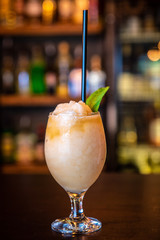 yellow cocktails on the bar counter