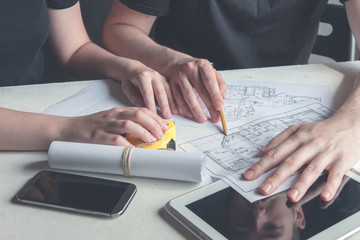 Team brainstorming process. Photo young creative managers crew working with new startup project in modern office. .Business project team working together at meeting room at office.