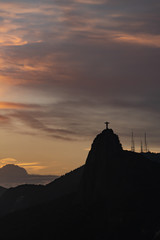 silhouette Christ the Redeemer on top of the mountain