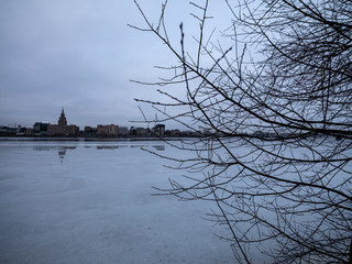 pieces of frozen ice in the lake in dim winter day