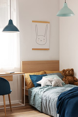 Pastel blue and mint accents in cozy children's bedroom