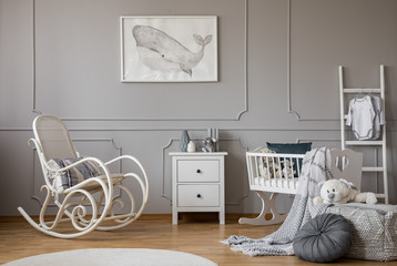 Modern grey baby nursery design in tenement house, copy space and poster on empty wall - obrazy, fototapety, plakaty