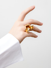 Simple beauty concept - jewelry accessories . Beauty delicate hands with manicure close up ....