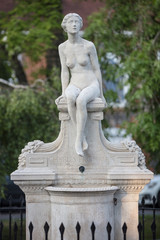 Fototapeta premium Memorial to American theatrical producer Charles Frohman, who died during the sinking of the Lusitania ship in 1915; the statue is located on the Causeway in Marlow, Buckinghamshire