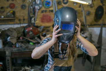 woman with welding mask