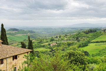 Fototapeta na wymiar Beautiful spring froggy landscape in Tuscany