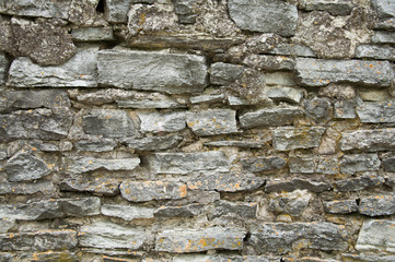 wall of large stones. The texture of the stone.
