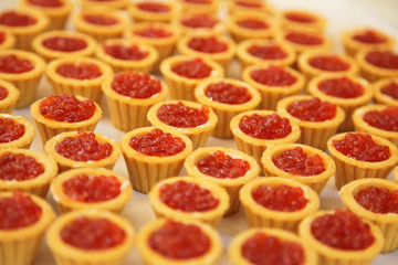 tray with red caviar tartlets