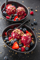 Berry refreshing ice cream scoops on plate