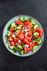 Summer salad with watermelon and cucumbers