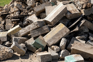 Big mountain of broken stones. Building stone by mountain.