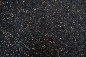 texture of asphalt from small and multi-colored stones