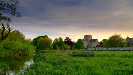 Fototapeta na wymiar Spring sunset over St Cross Hospital, Winchester, Hampshire, UK