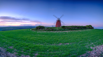 Sunset over Halnaker windmill in the South Downs National Park, UK
