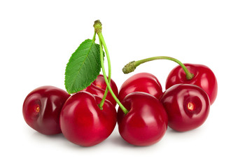 Sweet red cherries with leaves isolated on white background macro