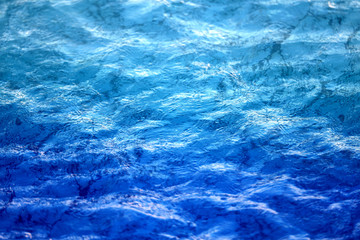Photo macro background with clear blue sea water