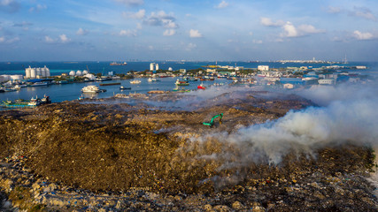 Waste plastic bottles and other types of plastic  waste at the Thilafushi waste disposal site.