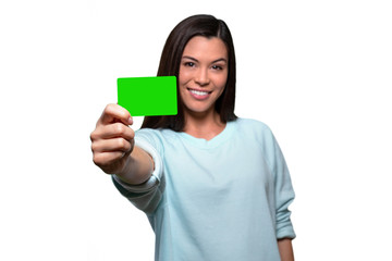 Young smiling female entrepreneur holding new business credit card, banking finance debit bank account 