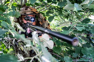 Close up on SWAT special military police force Sniper aiming to the target in combat action anti Terrorist battle war intervention
