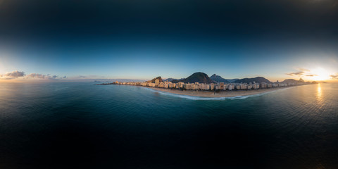 360 degree aerial panorama of Copacabana beach and neighbourhood in Rio de Janeiro at sunrise with...