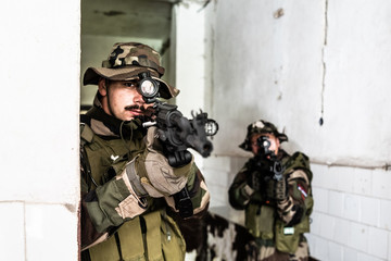 SWAT special military police force soldier in combat action anti Terrorist battle war intervention