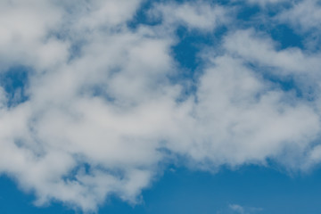 Obraz premium Blue sky background with white clouds
